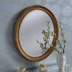 gold oval ornate gilt mirror