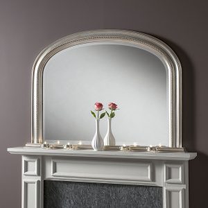 silver ornate over mantel mirror
