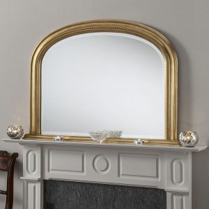 gold ornate over mantel mirror