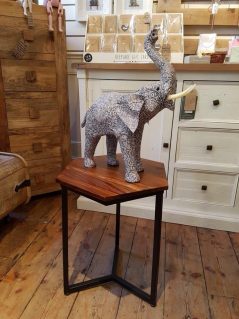 Sheesham wood hexagonal side table with metal base Sheesham wood hexagonal side table with metal base