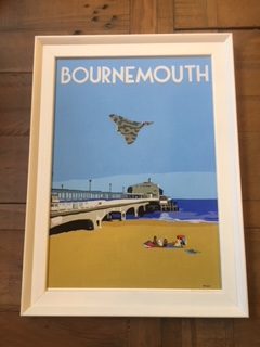 Vintage style framed print of Bournemouth beach with Vulcan bomber