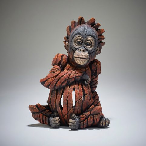 handpainted baby orangutan sculpture