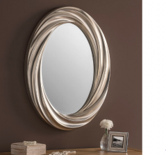silver color modern oval mirror made in the UK