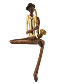 Shelf sitting jazz saxophone player figurine